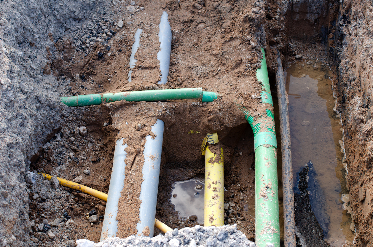 underground services,  including telecom, gas, electricity fibre optic ducts,  exposed for repair during groundworks and new road construction